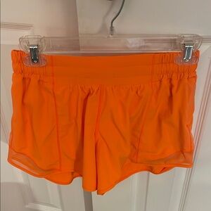 Lululemon Athletica Orange Hotty Hot Shorts 4”